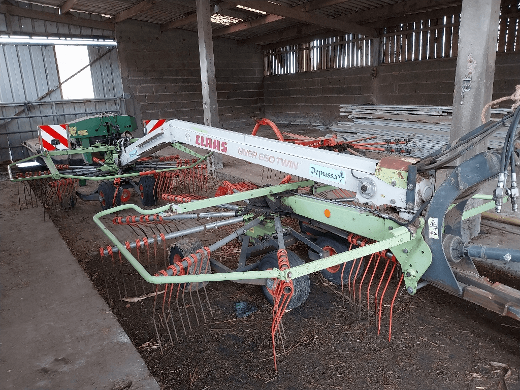 Photo CLAAS ANDAINEUR CLAAS LINER 650 TWIN